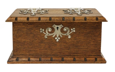 An Arts and Crafts oak and pewter-mounted casket