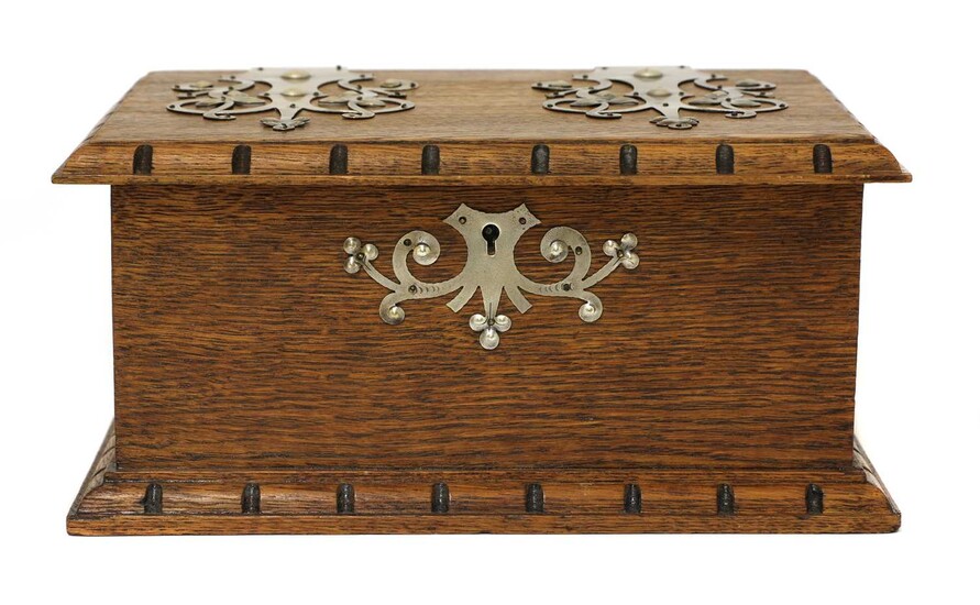 An Arts and Crafts oak and pewter-mounted casket