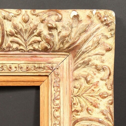 An Early 20th Century gilt composition frame with an oak sli...