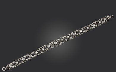 An Edwardian diamond bracelet, early 20th century, of openwork design, set with graduated old
