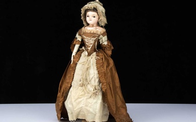 An English early 19th century wax over papier-mâché doll in rare 18th century style silk open robe