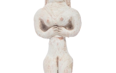 An Indus Valley fertility idol female figure, believed circa 3rd / 2nd Millennium BCE, modelled with hair style, necklaces, and hourglass figure with folded arms below chest. Measures approximately 11cm tall.