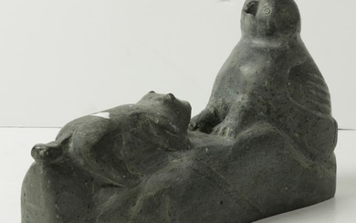 An Inuit soapstone carving of a bird and beaver