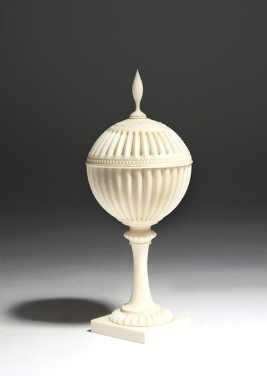 Λ An early 19th century ivory ornamentally turned …