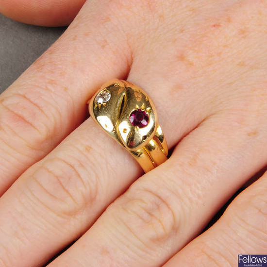 An early 20th century 18ct gold ruby and old-cut diamond snake ring.