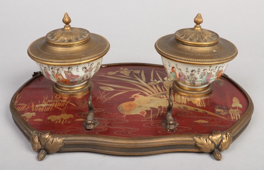 An early 20th century French gilt bronze and lacquer encrier...