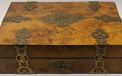 An early 20th century burr walnut veneered writing box