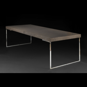 An extendible wengé veneered and chromed metal table. Italy, 1990s - 2000 (cm 250x73x100) (defects)