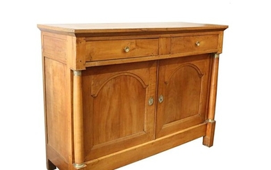 An important molded natural wood sideboard, it opens...