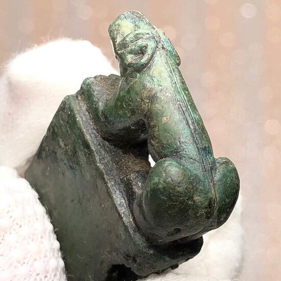 Ancient Roman Bronze Curious Figurine of a lying Panther but seen from above a Phalus. An Interesting Game of Images.