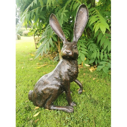Bronze model of a seated hare { 60cm H X 38cm W X 24cm D }.