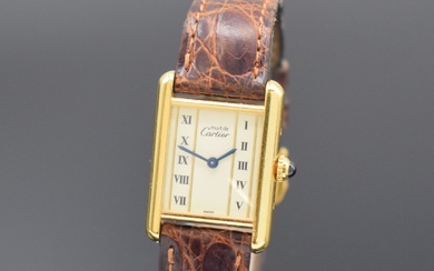 CARTIER Paris Montre-bracelet dame Tank Vermeil référence 5057001, Suisse, années 1990, boîtier en argent doré...