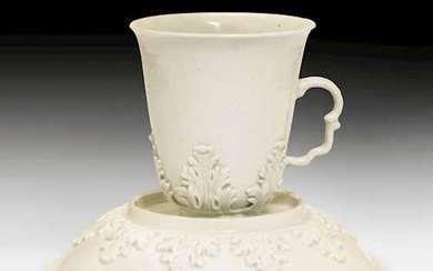 CHOCOLATE BEAKER AND SAUCER WITH ACANTHUS LEAVES IN RELIEF Meissen, ca. 1720.