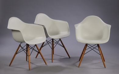 Charles Eames. A set of three armchairs, model DAW, white polypropylene (3)