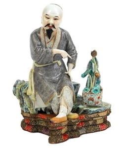 Chinese Porcelain Figure on Fabric Covered Base