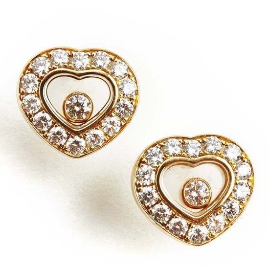 Chopard: A pair of “Happy diamonds” diamond ear studs each set with numerous brilliant-cut diamonds, mounted in 18k gold. Signed Chopard.