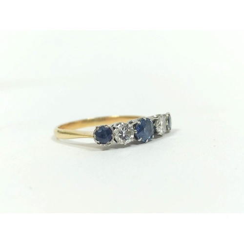Diamond and sapphire five stone ring, two brilliants approxi...