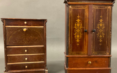 Due modelli di armadio e secretaire in legno decorati a finti intarsi in ottone in doratura a volute (difetti)