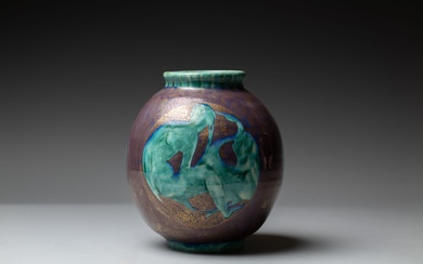 Edouard CAZAUX (1889-1974). Vase ovoide sur petit pied en céramique émaillée bleu et vert légèrement...