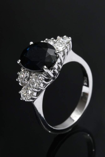 Elegant white gold 750 ring with oval faceted sapphire and diamonds (total approx. 0.66ct/VSI/W), 4,2g, size 52
