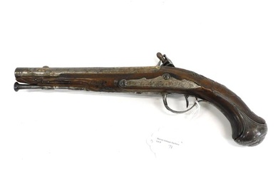 Flintlock pistol. 18th century. Carved and inlaid