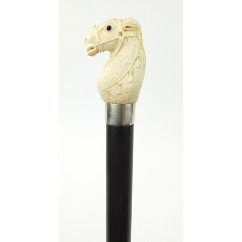 Good rosewood wood walking stick with carved ivory pommel in...
