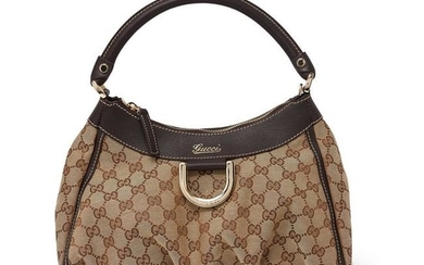 Gucci - a monogram GG canvas shoulder bag.