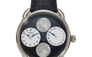 HERMÈS, REF. AR1.890A, ARCEAU L’HEURE DE LA LUNE, A FINE LIMITED EDITION 18K WHITE GOLD WRISTWATCH WITH MOTHER-OF-PEARL MOON PHASES, DATE, AND BLUE AVENTURINE DIAL