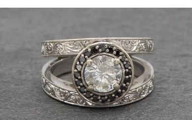 Impressive 18ct white gold diamond ring, central 1.5ct stone...