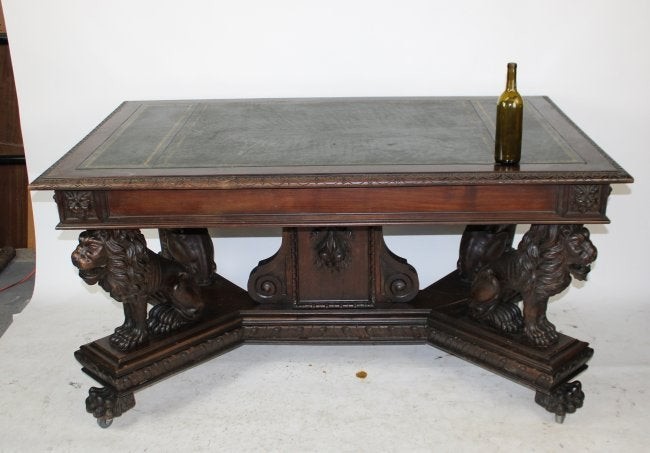 Italian library table with lion supports & leather top