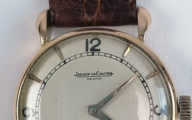 JAEGER LECOULTRE- Montre avec boîtier en or jaune, bracelet en crocodile. PB: 25,56 grs