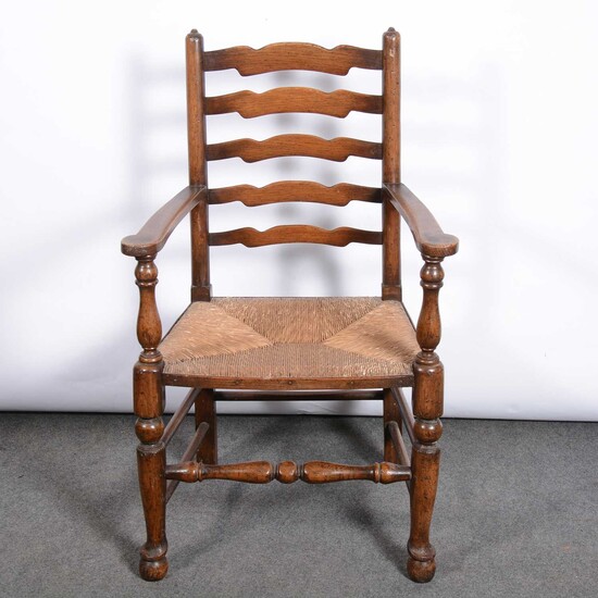 Joined oak gateleg table and four ladderback chairs