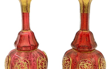PAIR OF RUBY AND GOLD GILDED BOHEMIAN GLASS VASES...