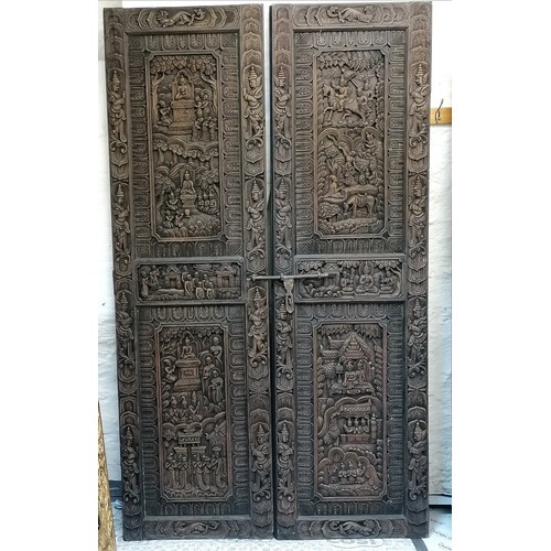 Pair of antique Burmese teak doors extensively relief carved...