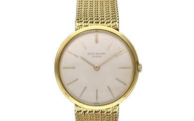 Patek Philippe Reference 2591 Calatrava | A yellow gold wristwatch with bracelet, Circa 1965