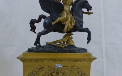 Restoration bronze clock with 2 patinas surmounted by "Pegasus" (?). Period: 19th century. Height: 51 cm.