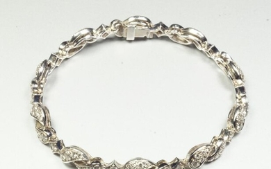 Semi-rigid bracelet in 18K (750/oo) white gold with articulated links...