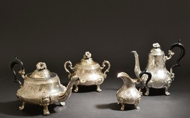 Silver tea and coffee service with chiselled decoration of foliage...