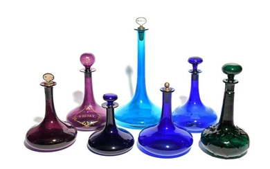 Seven coloured glass ship's decanters and stoppers 19th century, three...