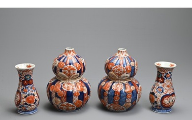 TWO PAIRS OF 19TH CENTURY JAPANESE IMARI VASES. The first of...