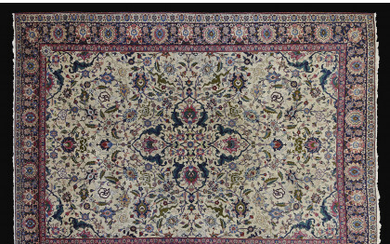 Tabriz carpet, Persia, first half of 20th century. Decorated with floral motifs. On the top an islamic inscription (385x285 cm)...