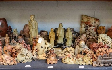 A collection of 20th century Oriental carved soapstone ornaments,...