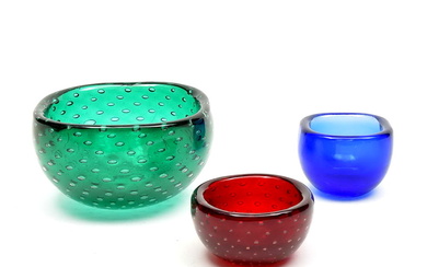 Three glass bowls: Heavy green glass bowl with...