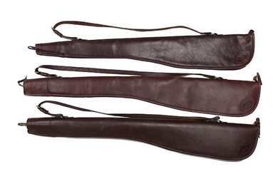 Three leather gunslips