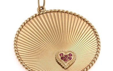 SOLD. Tiffany & Co.: A ruby pendant of 14k gold set with numerous circular-cut rubies....
