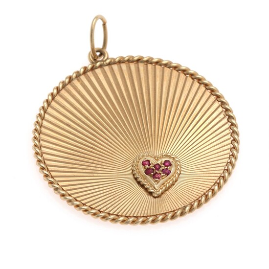 SOLD. Tiffany & Co.: A ruby pendant of 14k gold set with numerous circular-cut rubies....