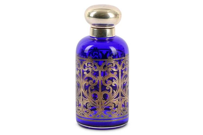 A modern blue glass silver overlay scent bottle of...
