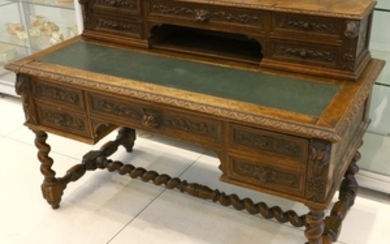 An Edwardian oak desk, early 20th century, with...