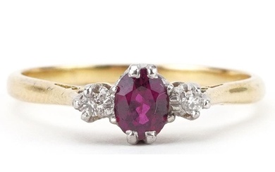 18ct gold ruby and diamond three stone ring, the ruby approx...