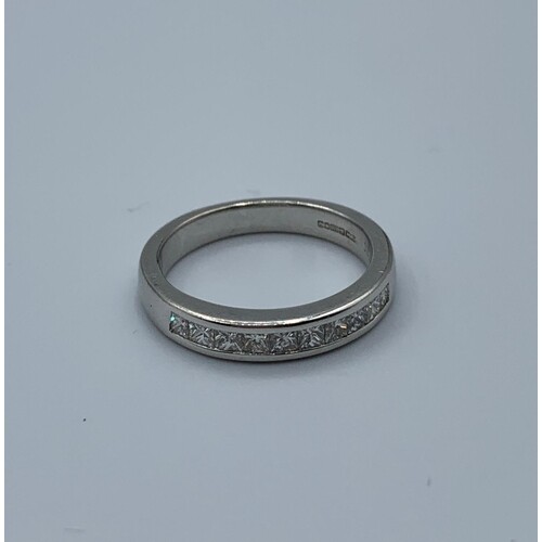 18ct white gold half eternity ring with princess cut diamond...
